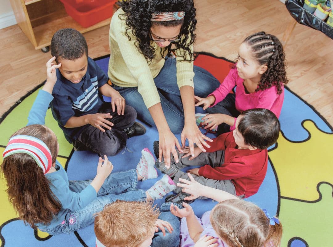 Kids Playing with Daycare Staff